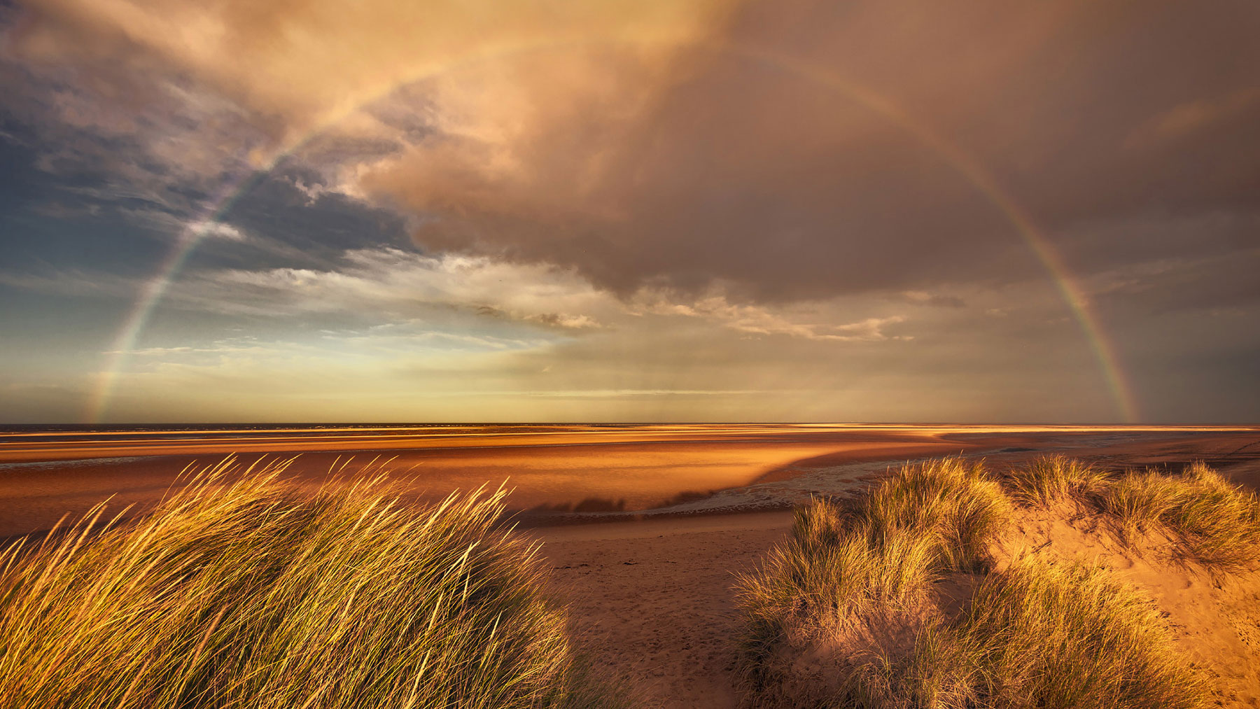 Two images, one of mist over a lake in Epping Forest and one of Loch Lomond in the autumn