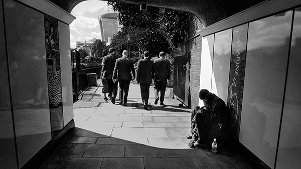 A black and white street photograph made with a compact camera or phone.