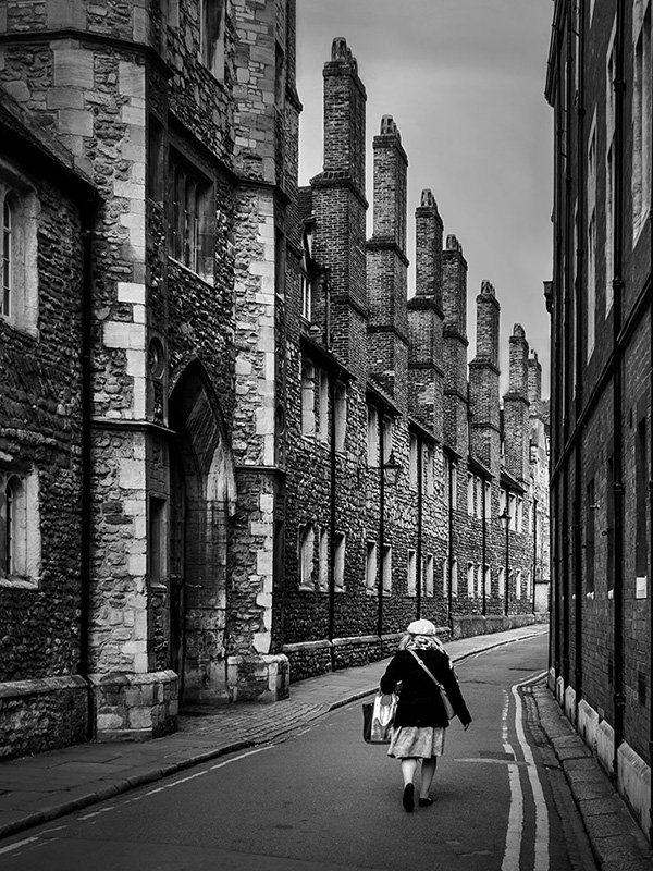 A black and white street photograph made with a compact camera or phone.