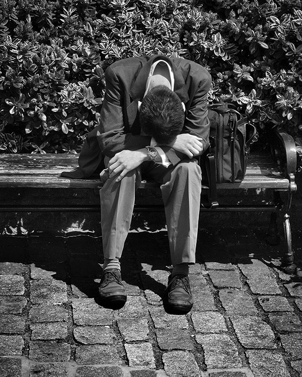A black and white street photograph made with a compact camera or phone.