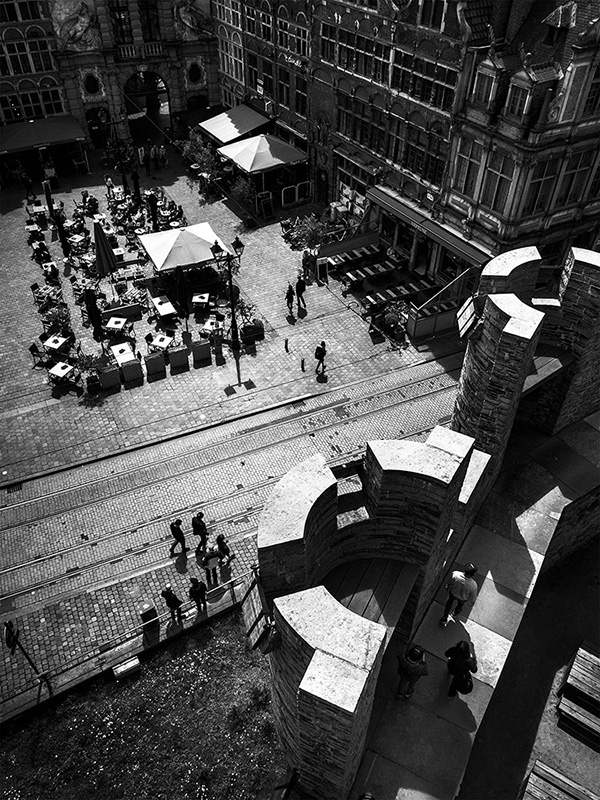 A black and white street photograph made with a compact camera or phone.