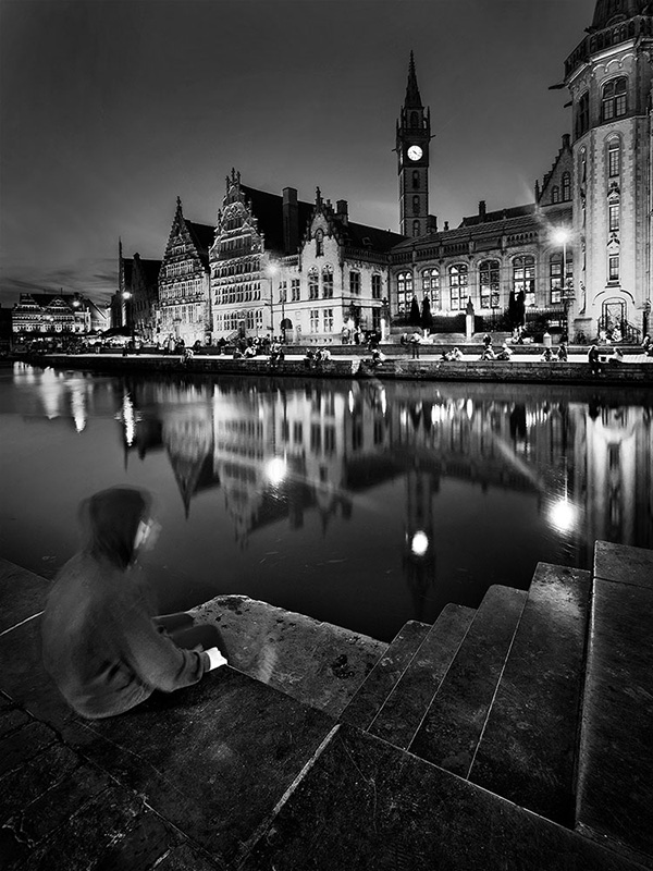 A black and white street photograph made with a compact camera or phone.
